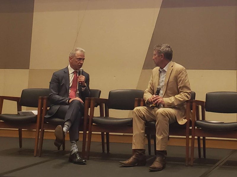 Andrei Iancu and Thomas Massie during a fireside talk.