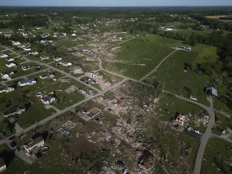 A path of destroyed homes is seen