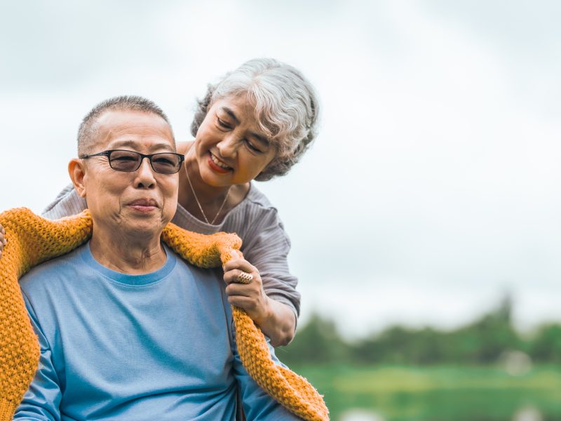Love and support within an Asian family as they care for their elderly parents
